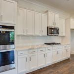 new home by Heatherland Homes at Mirror Lake