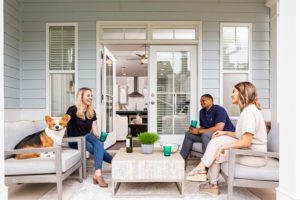 Family on back porch with dog